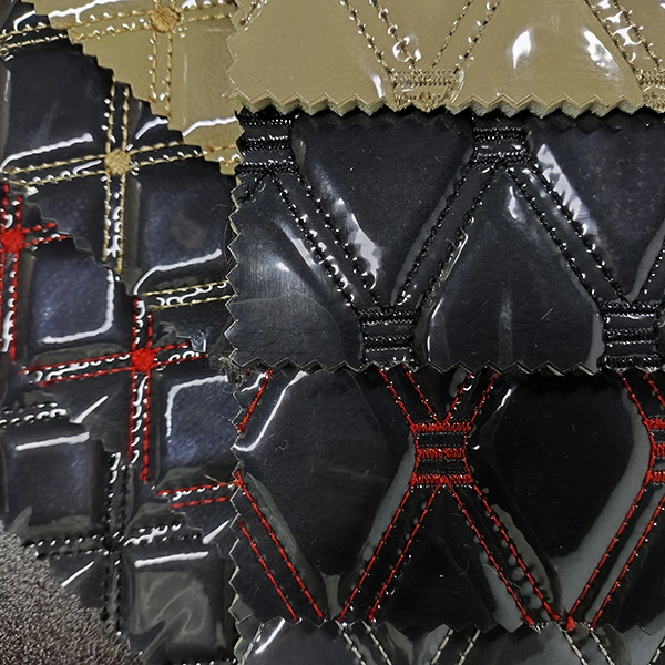 Pelle ricamata con foglio trasparente in PVC